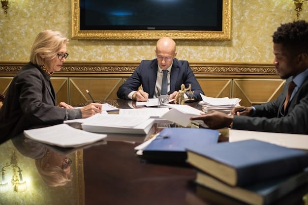 A panel of judges reviewing proposals for a cultural grant, seated around a table with documents and laptops in a conference room setting.