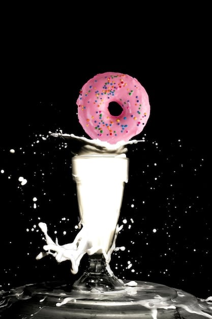 A visually striking image contrasting a sugary snack (like a donut or a soda) with a healthy alternative (like a piece of fruit or a handful of nuts). The image emphasizes the difference in nutritional value and the potential impact on mood and overall well-being.