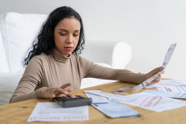 A person using a calculator while reviewing household bills and financial reports, focusing on managing expenses and budgeting during high inflation.