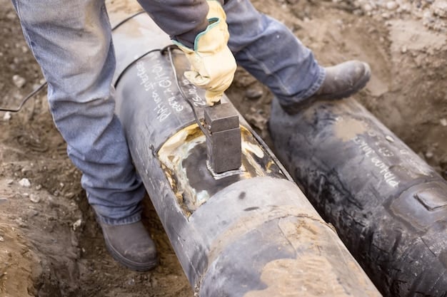 Workers installing new pipes in a trench, representing the infrastructure improvements related to water and sewage systems.