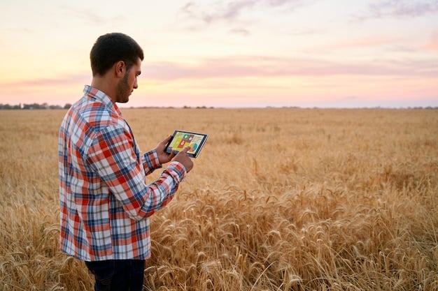 A farmer using a tablet to monitor crop health in a field, showcasing the integration of technology in modern agriculture.