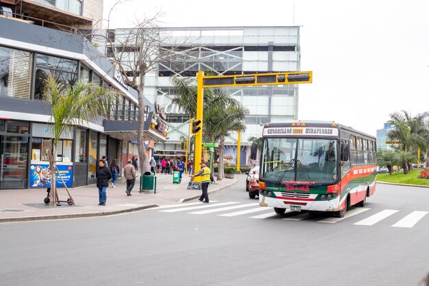 A modern bus rapid transit (BRT) station in a Brazilian city, with seamless connections to bicycle lanes and pedestrian walkways, showcasing integrated transport options and accessibility.