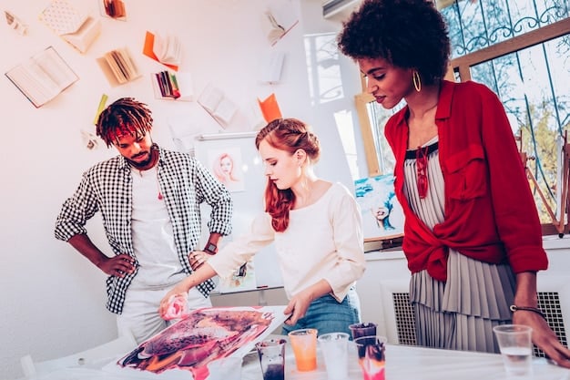 A diverse group of artists working on different projects in a studio. Some are painting, others are sculpting, and others are working on digital art. The atmosphere is creative and collaborative.