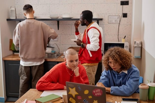 A diverse group of students participating in a collaborative coding workshop, focusing on hands-on learning and teamwork.