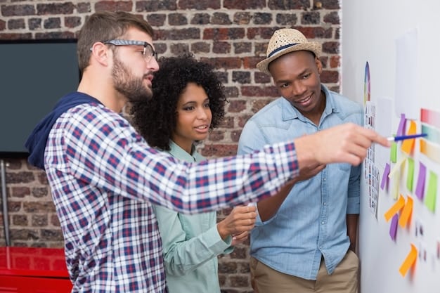 A diverse group of young professionals collaborating in a modern office space, brainstorming ideas on a whiteboard, showcasing teamwork and innovation.