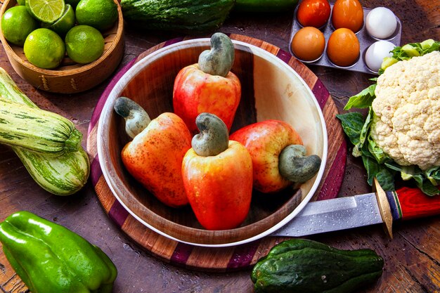A close-up shot of a variety of colorful and fresh vegetables, including broccoli, carrots, bell peppers, tomatoes, and leafy greens. The vegetables are arranged in an appealing manner, showcasing their vibrant colors and textures.