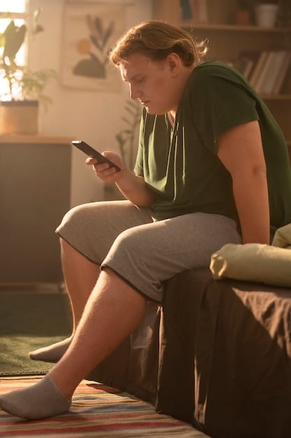 A person is using a mental health app on their smartphone while sitting on a park bench during a work break. The app features calming visuals and offers stress-relief exercises and mindfulness techniques.