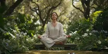 Person meditating in nature, leaving phone aside for digital detox